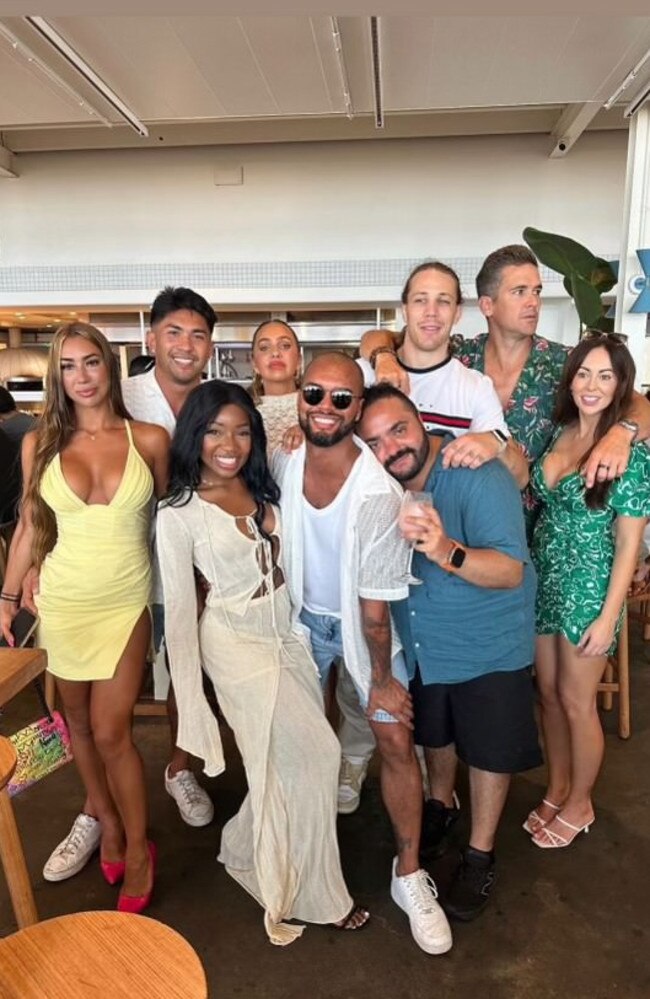 Jonathan McCullough and Ellie Dix (both in green) at the Burleigh Pavilion on the Gold Coast with fellow contestants. Picture: Supplied