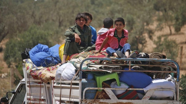 Children flee the Syrian regime attacks in Daraa in June 2018. Picture: AFP