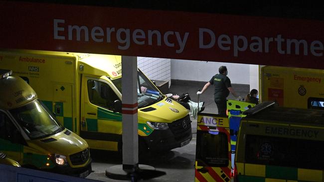 A paramedic wheels a patient from an ambulance into the Accident and Emergency (A&amp;E) department at Guy’s and St Thomas' Hospital in central London. Picture: AFP