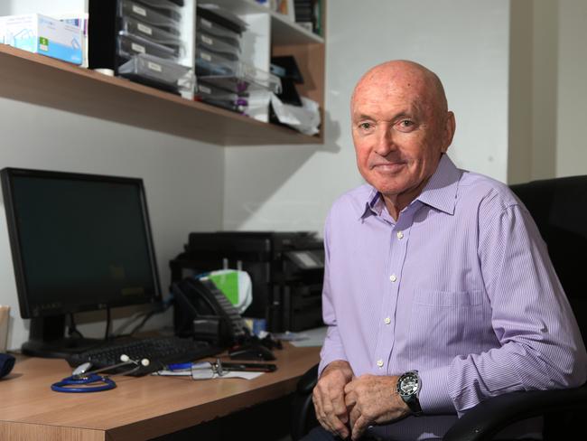 Southport Sharks President Dr Alan Mackenzie in his Surfers Paradise doctors office. Picture by Scott Fletcher