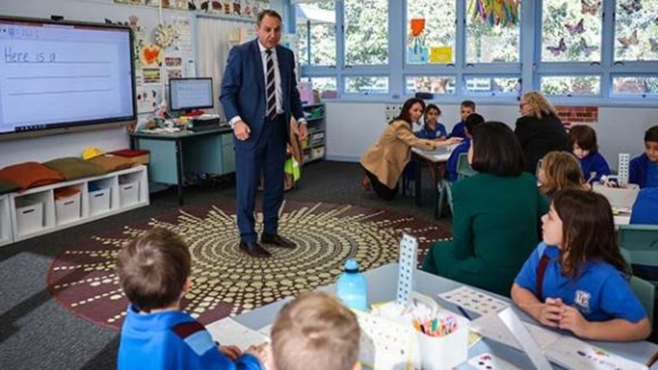 Secretary of the NSW Education Department, Murat Dizdar, with students at Toongabbie East Public School. Picture: NSW Department of Education