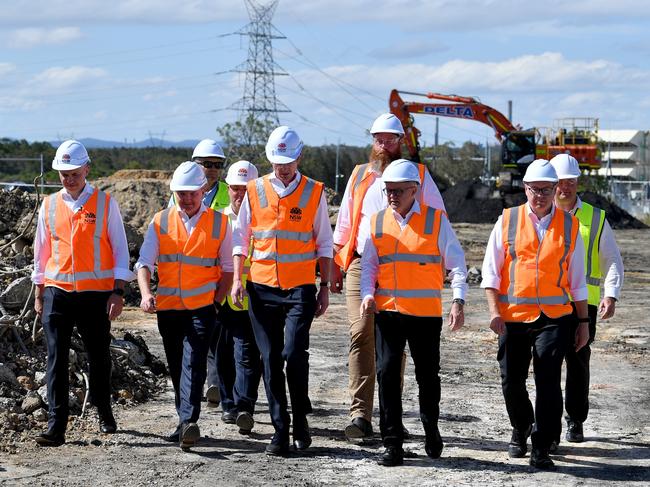 NSW Treasurer Matt Kean (far left), Federal Minister for Climate Change and Energy Chris Bowen (second left), NSW Premier Dominic Perrottet (centre), and Australian Prime Minister Anthony Albanese (third right) tour the site of the new Waratah Super Battery project, at the former Munmorah Power Station in Colongra, NSW. Picture: AAP