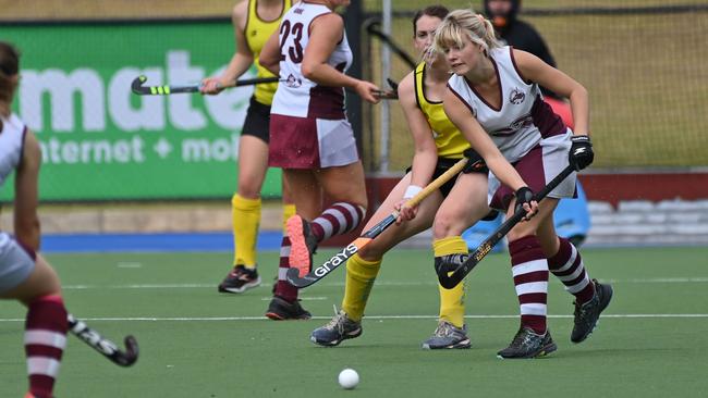 Lauren Thomas, of Grange, gets to the ball first in the Royals’ Hockey SA Premier League encounter with Seacliff. Picture: Keryn Stevens