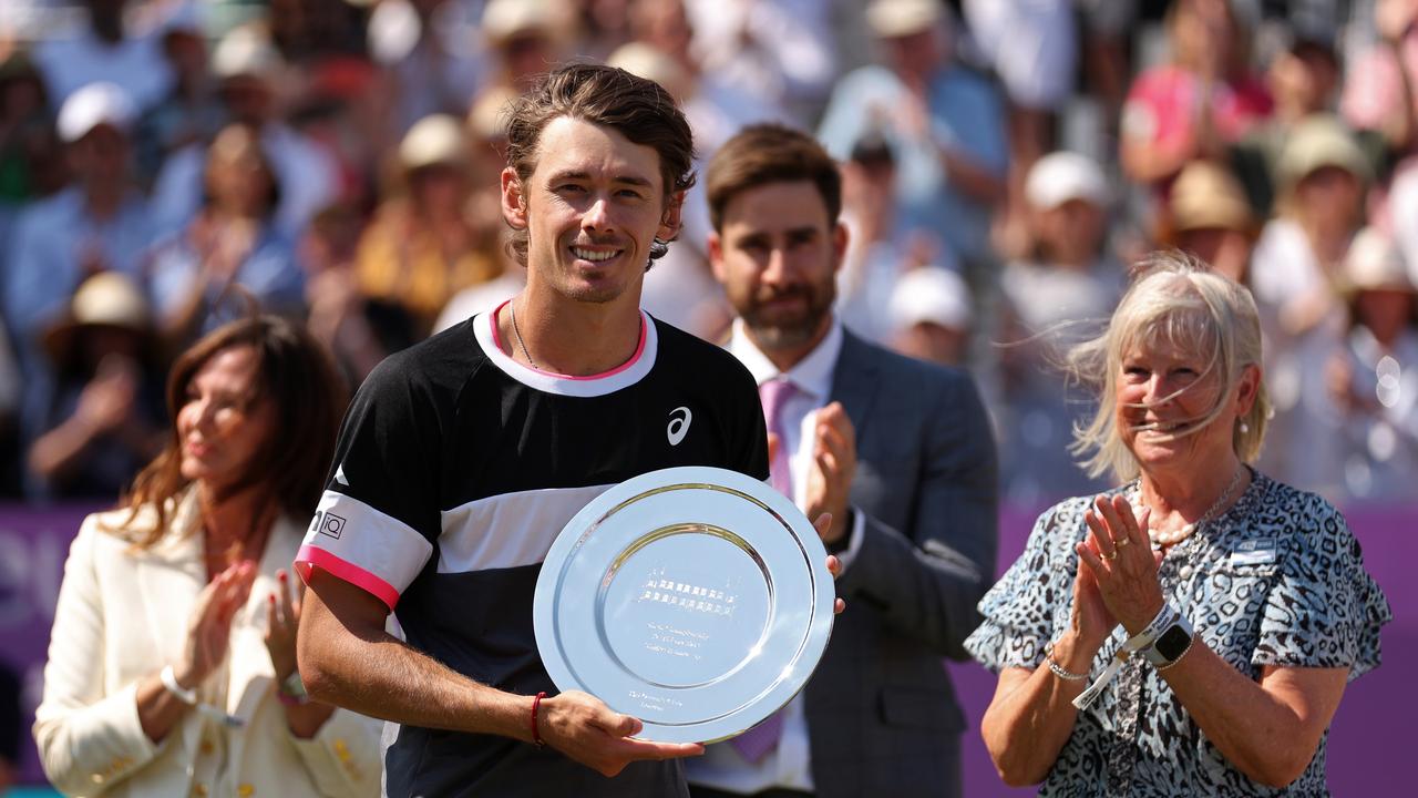 LONDON, ENGLAND – JUNE 25: Alex de Minaur of Australia poses with his runners-up trophy after defeat to Carlos Alcaraz of Spain in the Men's Singles Final match on Day Seven of the cinch Championships at The Queen's Club on June 25, 2023 in London, England. (Photo by Julian Finney/Getty Images)