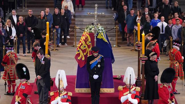 Prince William, Prince of Wales, Prince Harry, Duke of Sussex, Princess Eugenie of York, Princess Beatrice of York, Peter Phillips, Zara Tindall, Lady Louise Windsor, James, Viscount Severn hold a vigil in honour of Queen Elizabeth II (Photo by Yui Mok-WPA Pool/Getty Images)