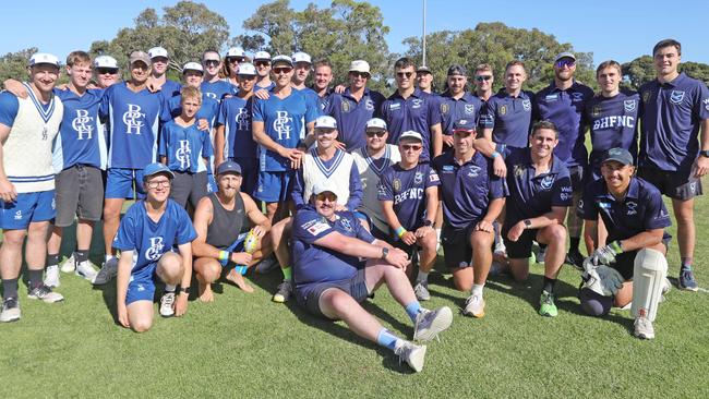 Barwon Heads FC and Barwon Heads CC men’s teams share a picture after a game. Picture: Mark Wilson