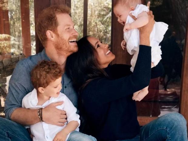 Prince Harry and Meghan Markle with Archie and Lilibet in their 2021 Christmas Card . (Photo by Alexi Lubomirski/Handout/The Duke and Duchess of Sussex)