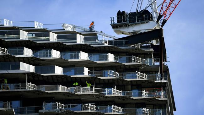 A worker looks out over a construction site in Melbourne. Picture: AFP