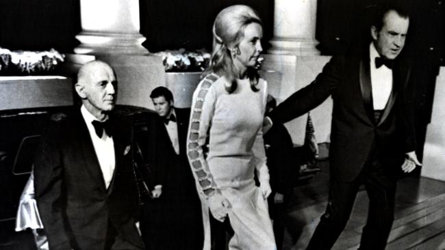 US president Richard Nixon (R) escorts Sonia McMahon wearing 'that' dress as husband, Australian Prime Minister William McMahon (R) follows on to a function at White House in Washington DC, 11/1971.