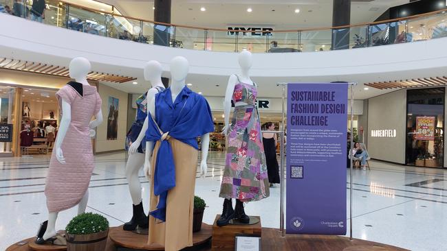 Newcastle-based charity, Corethics, has been rocked by the theft of a designer dress from a display mannequin in Charlestown Square (pink dress). Garments are finalists in a sustainability fashion competition. Supplied.