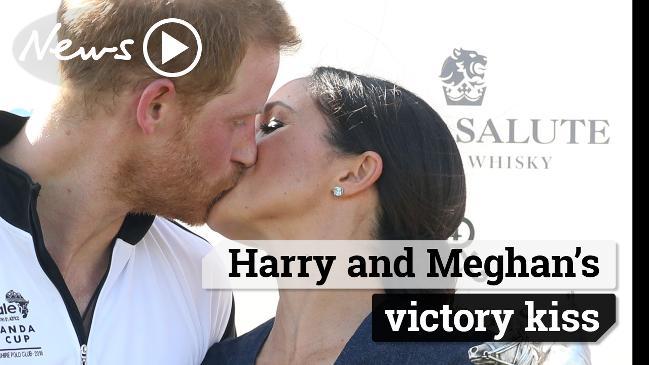 Harry and Meghan's victory kiss