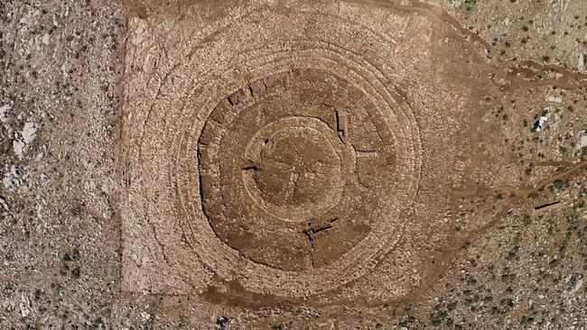 A 4000-year-old circular stone structure was found on a hill in Crete, posing a threat to the construction of a new international airport. Picture: AFP