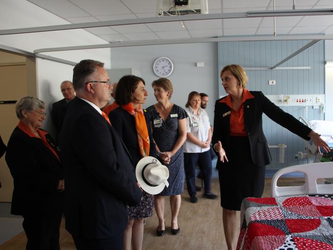 Ms McBride shows Ms Berejiklian the “cuddle bed”.