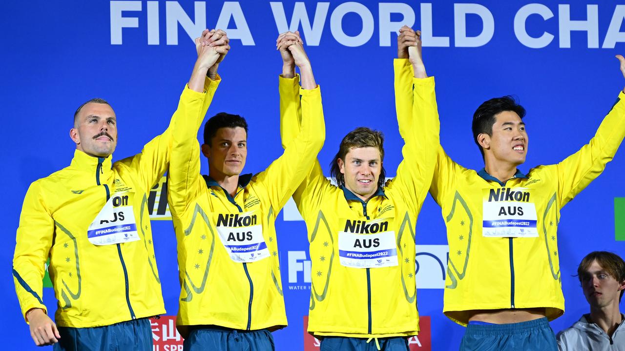 Kyle Chalmers, Jack Cartwright, Matthew Temple and William Xu Yang on the podium for the men's 4x100m freestyle relay. Photo by Quinn Rooney/Getty Images.