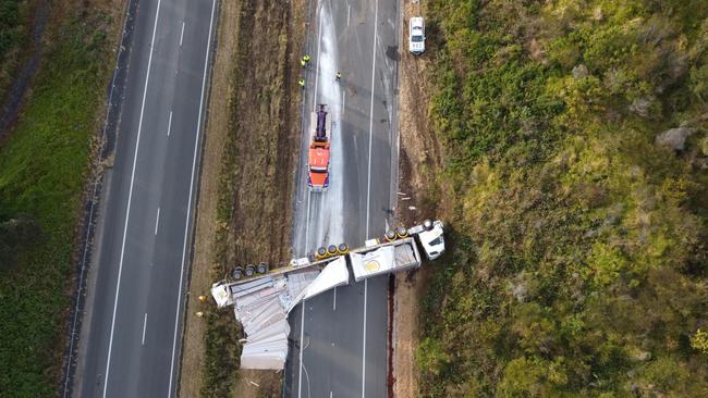 Highway reopens after B-double rollover near Coffs Harbour