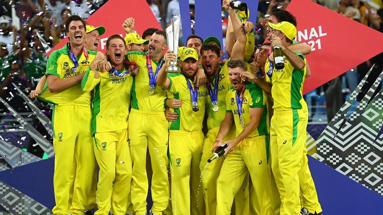 Aaron Finch of Australia lifts the ICC World T20 Trophy with teammates. Photo by Alex Davidson/Getty Images