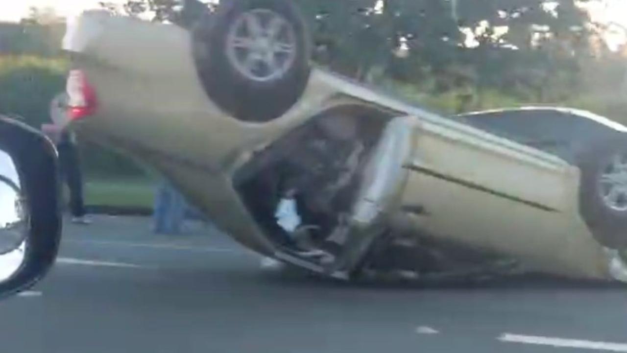 Adult, three children in car rollover near fast food joint