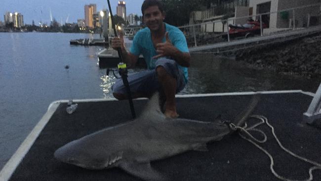 Nick Dinatale with the 1.5m bull shark he landed on Thursday night.