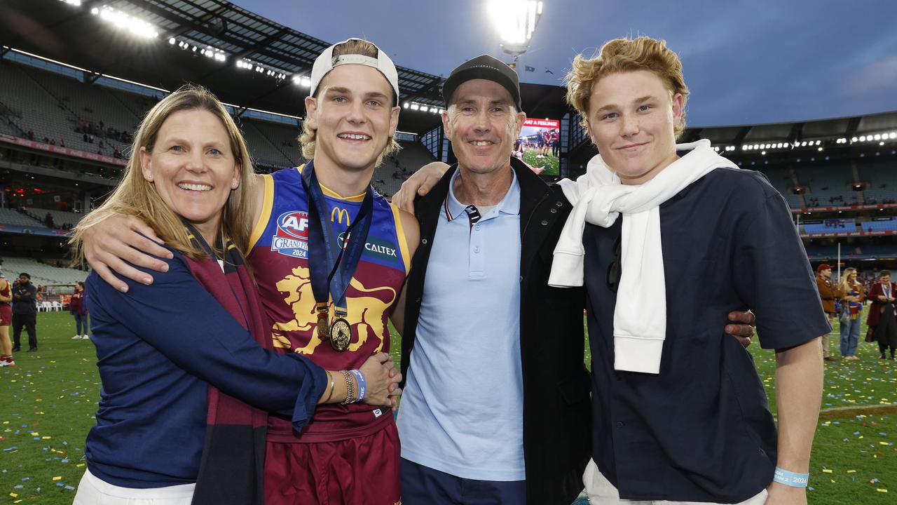 NCA. MELBOURNE, AUSTRALIA. September 28 , 2024. AFL Grand Final. Sydney Swans vs Brisbane Lions at the MCG. Will Ashcroft of the Lions with his parents Rebecca and Marcus and brother Levi . Pic:Michael Klein