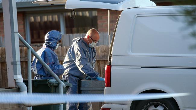 Forensic officers at the Sydenham house where Vicki Ramadan, 77, was found dead. Picture: Ian Currie