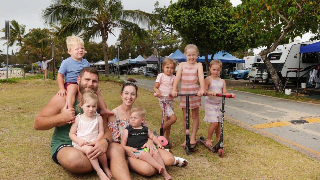 Chris and Natalie Neuendorf from Brisbane with their children Sylvie, Arthur and Seaton and their nieces Harper, Evelyn and Charlotte at Cotton Tree Holiday Park on the Sunshine Coast. Picture: Lachie Millard