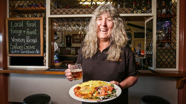 Andrea 'Stretch' McWhinney is the owner and manager of the Bruthen Inn Hotel and is serving up a venison parma. Picture: Nicole Cleary