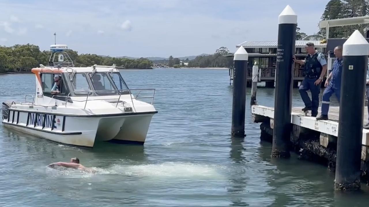 Frantic search after car drives off Central Coast wharf