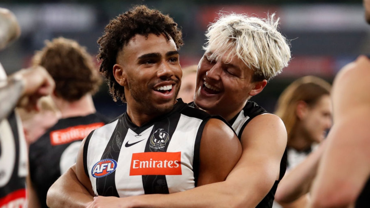 MELBOURNE, AUSTRALIA - MAY 29: Isaac Quaynor of the Magpies and Jack Ginnivan of the Magpies celebrate during the 2022 AFL Round 11 match between the Collingwood Magpies and the Carlton Blues at the Melbourne Cricket Ground on May 29, 2022 in Melbourne, Australia. (Photo by Dylan Burns/AFL Photos via Getty Images)