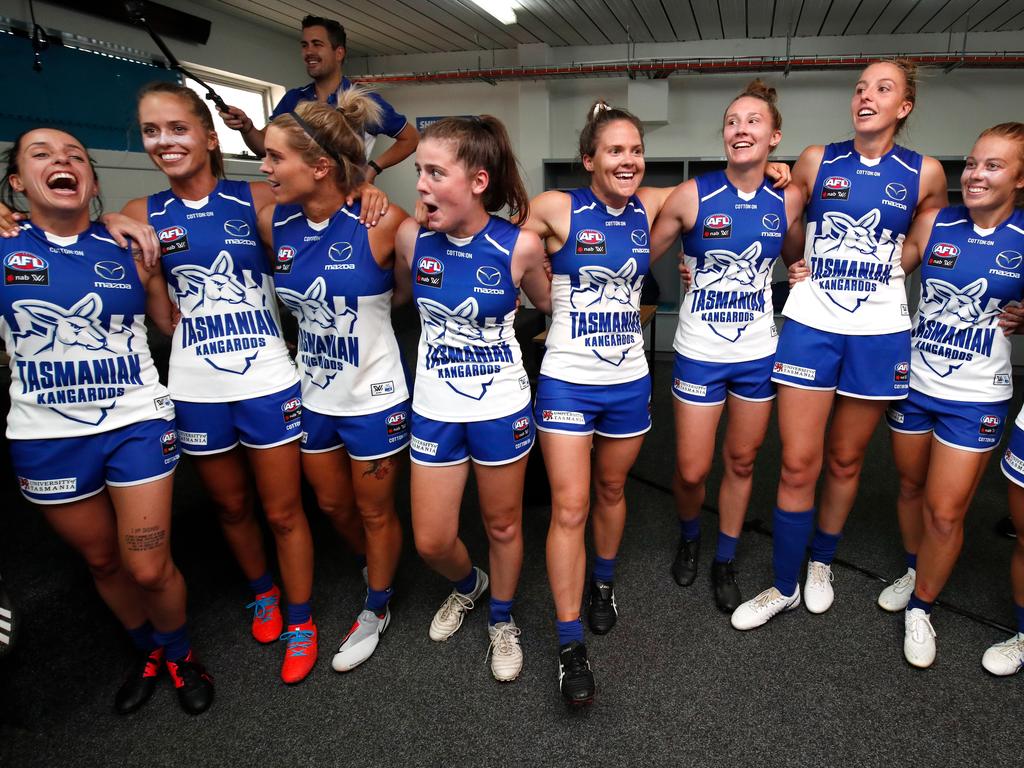 Kangaroos players sing the team song after winning the AFLW Round 1 match at North Hobart Oval.bruary 03, 2019 in Hobart, Australia. Picture: Adam Trafford/AFL Media/Getty Images