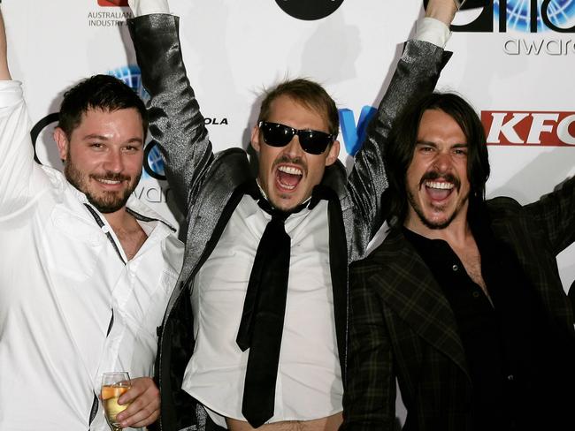 (L-R) Members of Silverchair Chris Joannou, Daniel Johns and Ben Gillies pose with their awards at the 2007 ARIA Awards at Acer Arena on October 28, 2007 in Sydney, Australia. The 21st annual Australian Recording Industry Association (ARIA) Awards recognise excellence and innovation across all genres of Australian music, and are a culmination of an events season which includes the ARIA Hall of Fame and the ARIA Fine Arts Awards. There are 28 awards categories, 26 of which are voted for by the musician's peers and 2 are a result of audited sales results. (Photo by Don Arnold/WireImage)