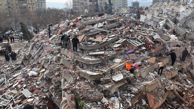 Civilians look for survivors under the rubble of collapsed buildings in Kahramanmaras. Picture: Adem Altan/AFP