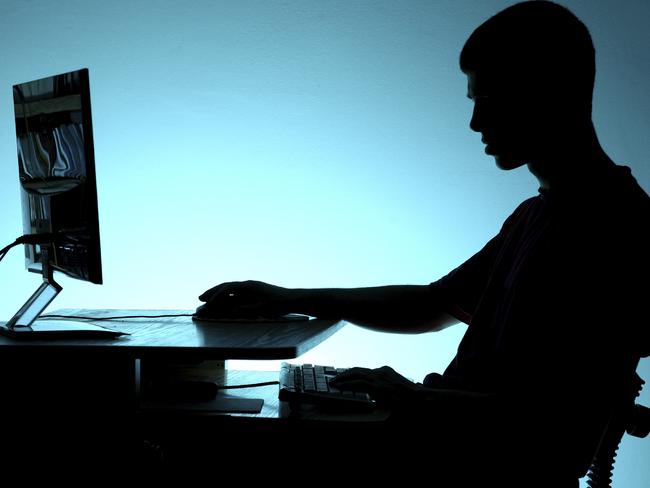 Silhouette of people using personal computers Source: iStock / Getty Images