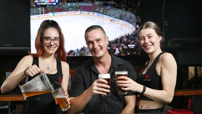 The Union Jack Hotel has been crowned the fifth hottest pub in Australia by Mad Monday travel agency, which specialises in footy trips, buck's and hen's parties. The Jack bartender Layla Wone, manager Jay Gwyn and bartender Kayla Wecker toast the pub's success with a cold drink in the beer garden, with some live sport on the big screens. Picture: Brendan Radke