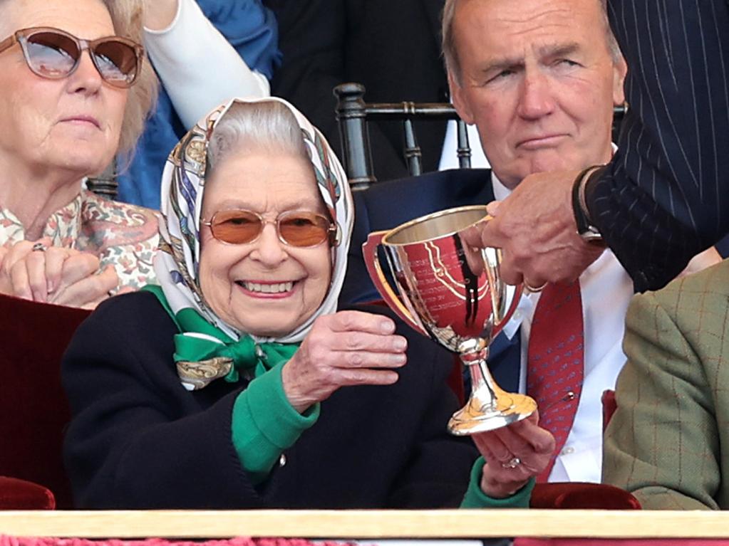 Queen Elizabeth II receives the winners cup at The Royal Windsor Horse Show at Home Park on May 13, 2022. Picture: Chris Jackson/Getty Images