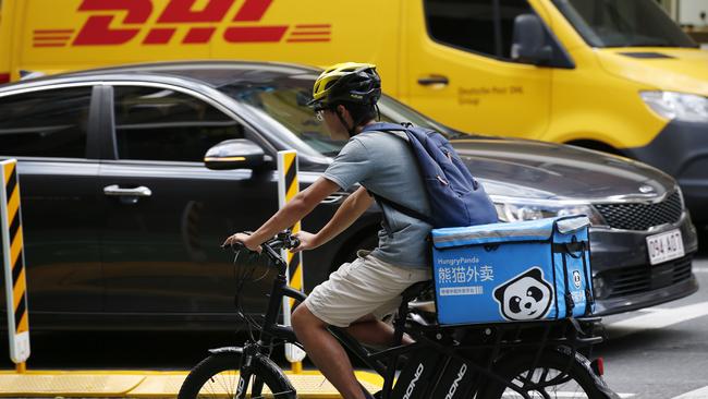 A food delivery cyclist using one of the CBD’s new cycleways. Picture: Josh Woning