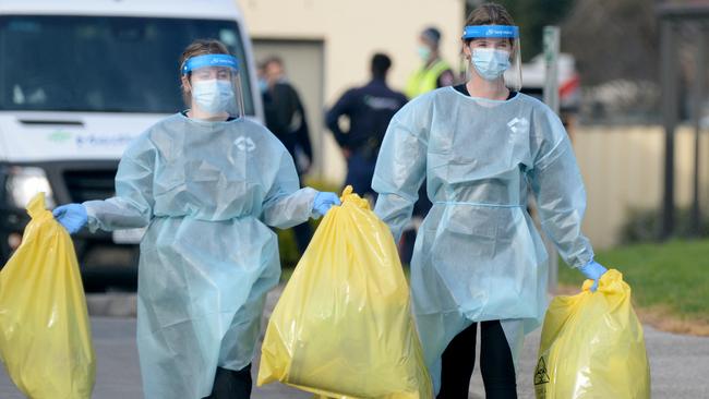 Medical waste is removed from St Basil's Home for the Aged at Fawkner. Picture: Andrew Henshaw