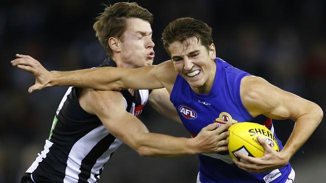 Marcus Bontempelli fends off fellow 2013 draftee Tom Langdon during his first career win. Picture: Michael Klein