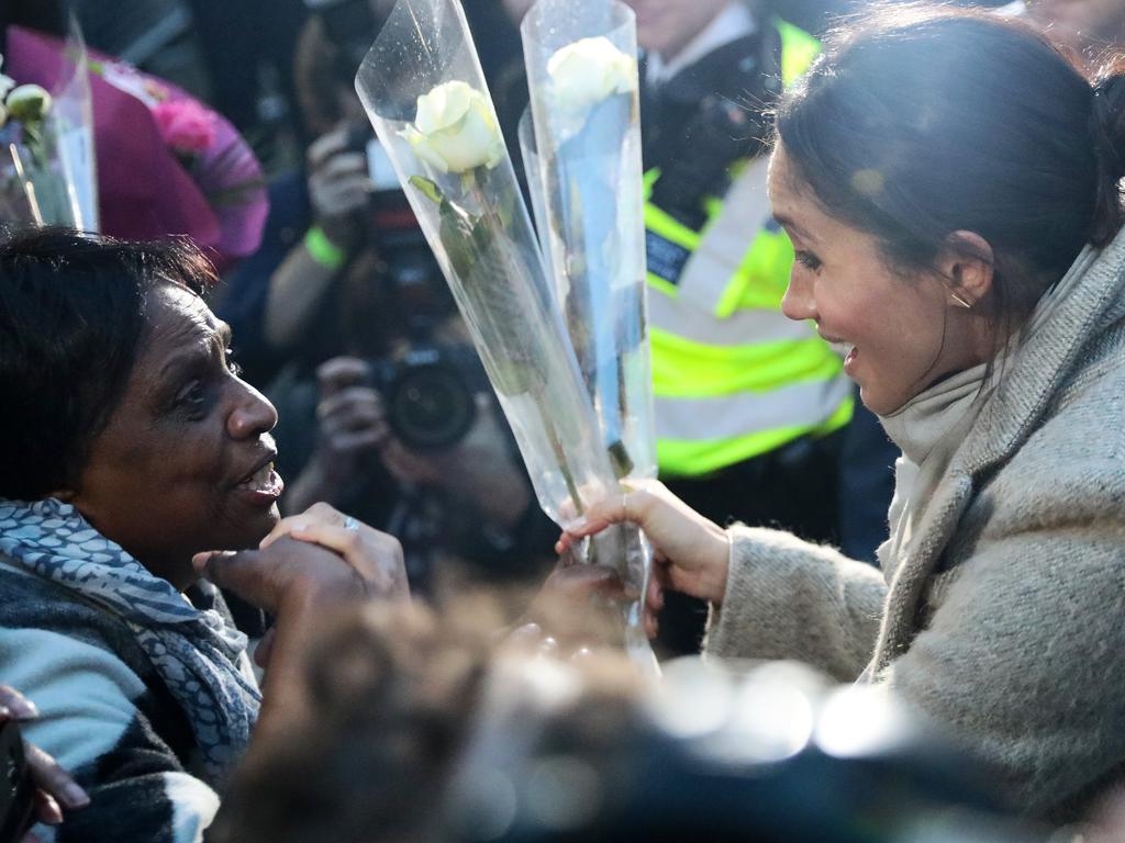 LONDON, ENGLAND - JANUARY 09: Prince Harry and Meghan Markle meet well-wishers during a visit to Reprezent 107.3FM in Pop Brixton on January 9, 2018 in London, England. The Reprezent training programme was established in Peckham in 2008, in response to the alarming rise in knife crime, to help young people develop and socialise through radio. (Photo by Jack Taylor/Getty Images)