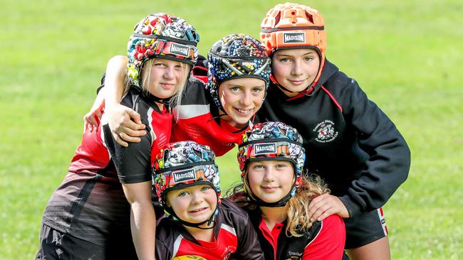 Junior players will be made to wear helmets. Picture: Tim Carrafa