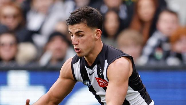 MELBOURNE, AUSTRALIA - JULY 28: Nick Daicos of the Magpies in action during the 2024 AFL Round 20 match between the Collingwood Magpies and the Richmond Tigers at the Melbourne Cricket Ground on July 28, 2024 in Melbourne, Australia. (Photo by Dylan Burns/AFL Photos via Getty Images)