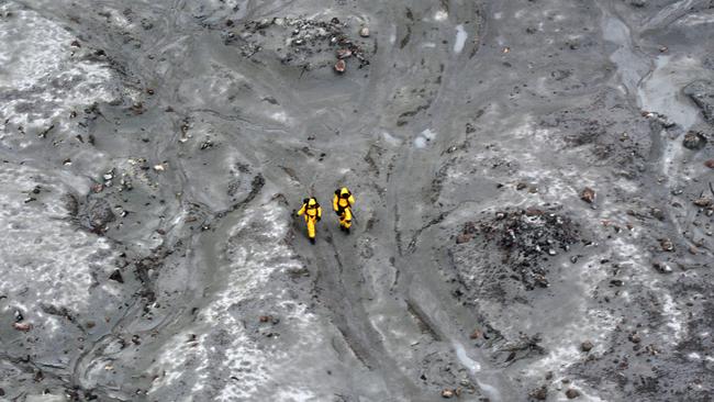 Two soldiers during the recovery operation on Friday. Picture: Getty Images