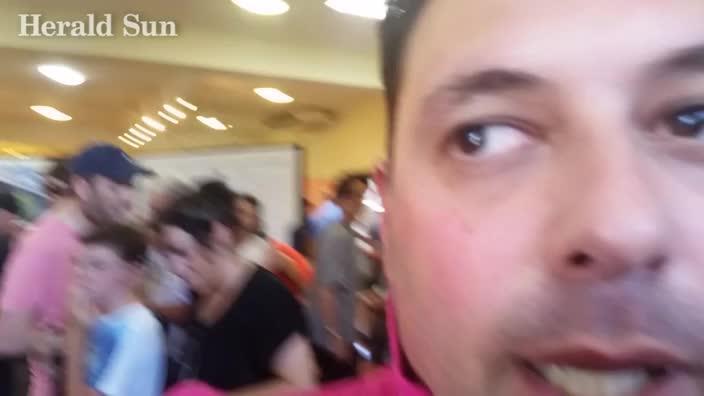 Minister confronts protester