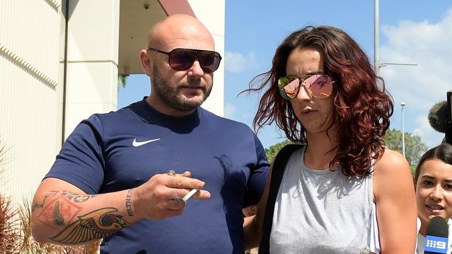 Hells Angel Samuel King and girlfriend Nikki Napier leave Darwin Local Court yesterday.