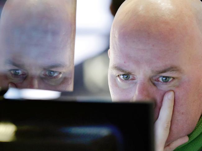 Specialist John O'Hara works at his post on the floor of the New York Stock Exchange, Thursday, Jan. 7, 2016. U.S. stocks are opening sharply lower as worries intensify about China's economy and dropping oil prices. (AP Photo/Richard Drew)