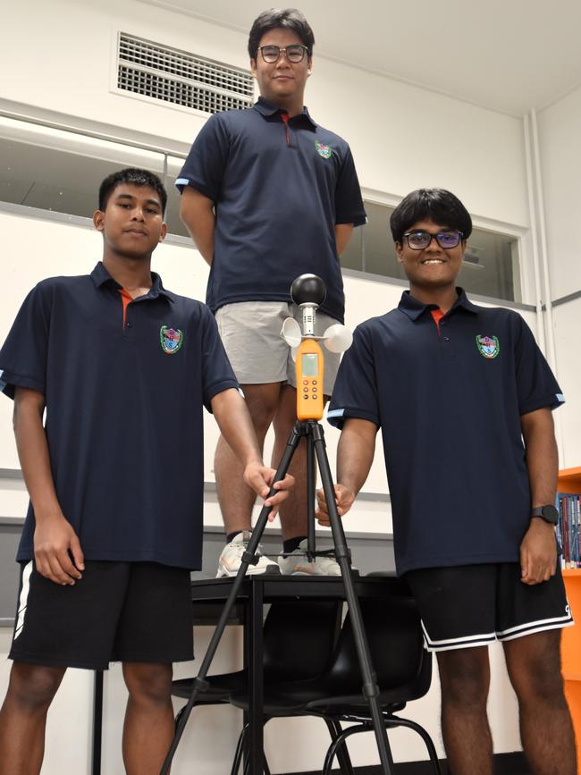Darwin High School students Monishi Rangchak Tripura, Pothik Vincent Mondol, and Mohammad Niyaz Hasan are calling on the NT community to help them raise enough money to present their project in LA. Picture: Sierra Haigh