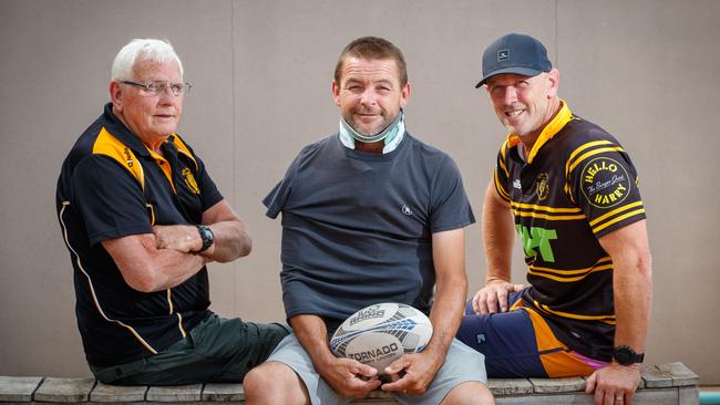 Damian Bruce (centre) with former Brighton Rugby Club coach Barry Cooper and old teammate Richard Wasley. Damian is unable to work for six months after breaking his neck jumping in the family pool.