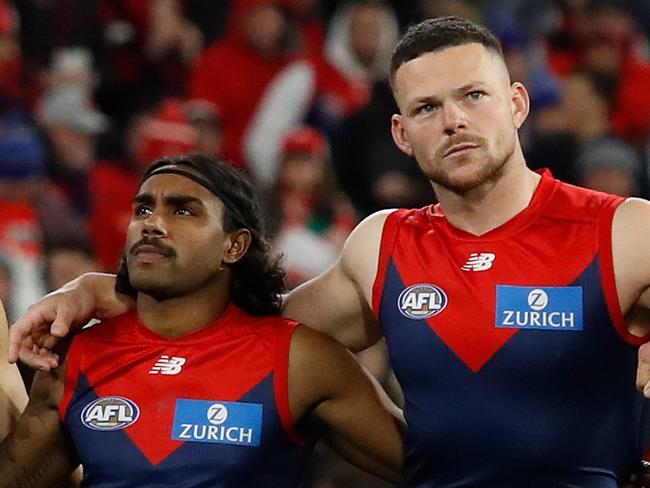 MELBOURNE, AUSTRALIA - SEPTEMBER 02: Christian Petracca, Kysaiah Pickett and Steven May of the Demons look on during the 2022 AFL Second Qualifying Final match between the Melbourne Demons and the Sydney Swans at the Melbourne Cricket Ground on September 2, 2022 in Melbourne, Australia. (Photo by Dylan Burns/AFL Photos via Getty Images)