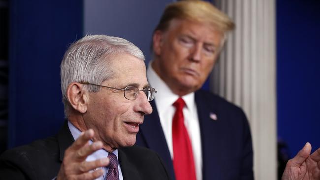 US President Donald Trump watches as Dr. Anthony Fauci, director of the National Institute of Allergy and Infectious Diseases, speak about the coronavirus in the James Brady Press Briefing Room of the White House in Washington. Picture: AP Photo/Alex Brandon