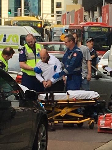 Police officer knocked off motorcycle during pursuit in Parramatta ...