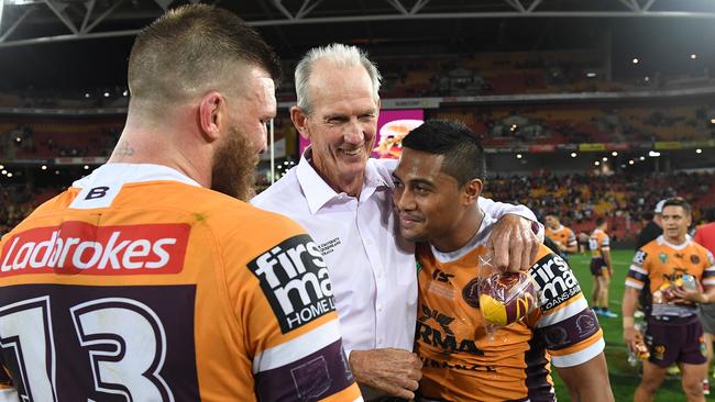 Broncos coach Wayne Bennett embraces Anthony Milford of the Broncos during the Round 25 NRL match between the Brisbane Broncos and the Manly-Warringah Sea Eagles at Suncorp Stadium in Brisbane, Sunday, September 2, 2018. (AAP Image/Dave Hunt) NO ARCHIVING, EDITORIAL USE ONLY